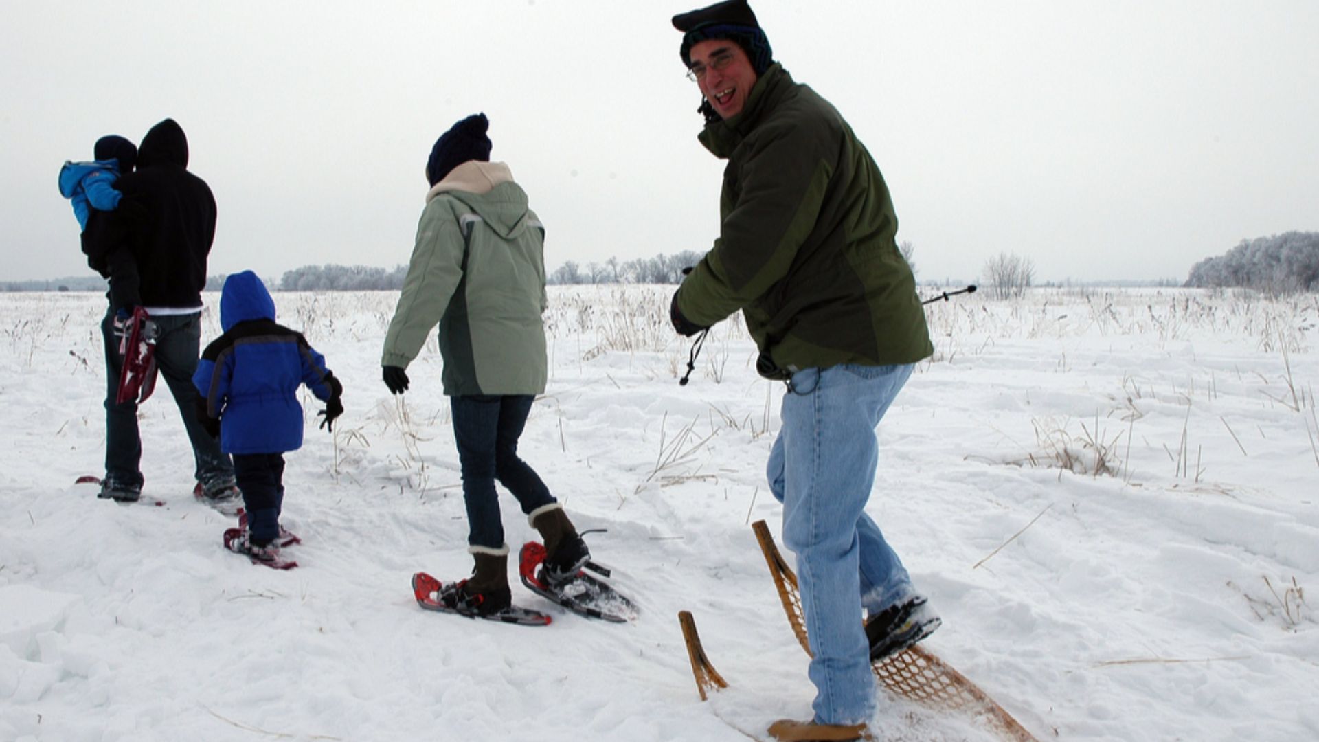 USFWS Regional Director Tom Melius joins a group snowshoeing at Sherburne National Wildlife Refuge, MN, during the refuge's 2011 Winterfest. Credit: Tina Shaw