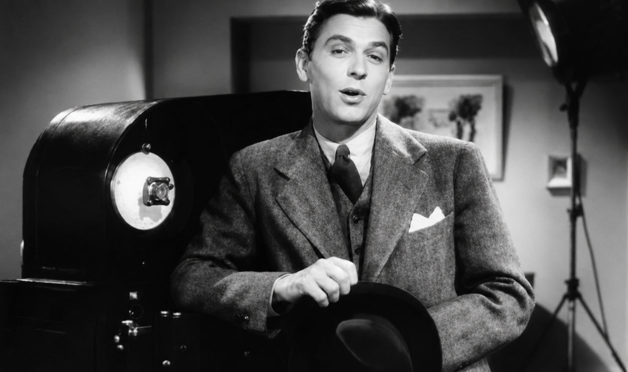 Screenshot from Love is on the Air (1937) 