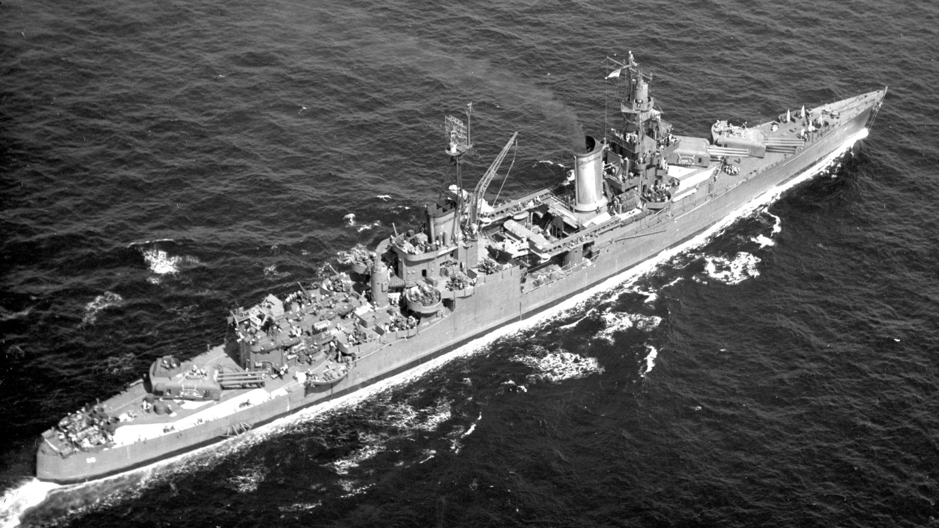 The U.S. Navy heavy cruiser USS Indianapolis (CA-35) underway at sea between May 1943 and May 1944. She is painted in Camouflage Measure 21.
