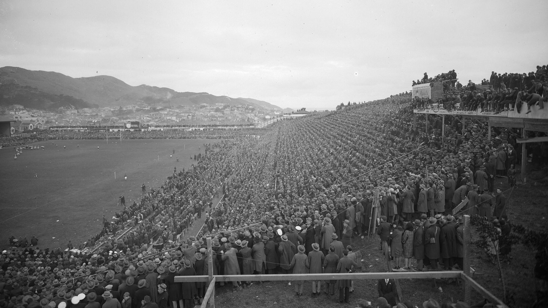 Photographer: William Hall Raine (1892-1955)[1] 
Crowd watching a rugby match at Athletic Park, Wellington, ca 1930
Reference number: 1/1-005427-G
Original negative 

Photographic Archive, Alexander Turnbull Library