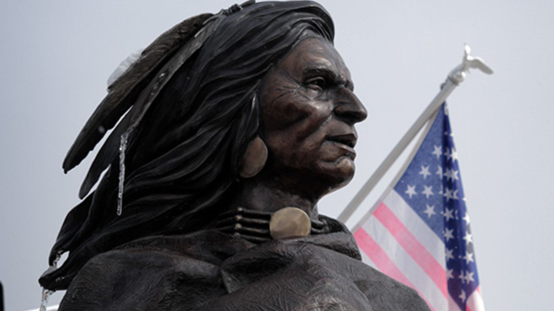 The juxtaposition of the flag with this sculpture of an Indian made me think of Black Kettle, who was a Southern Cheyenne Indian chief. Black Kettle's people were camped on the Sand Creek Reservation in southeast Colorado in 1864 when a group of Colorado 