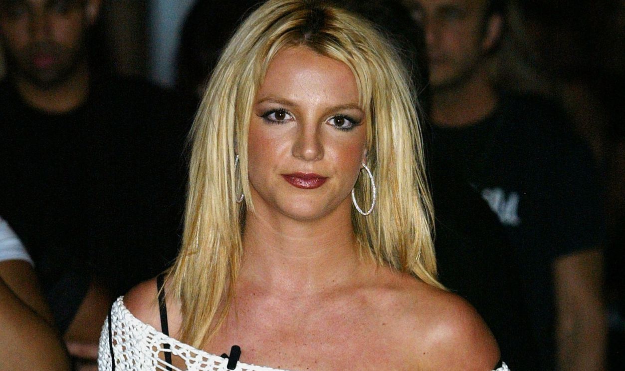 Britney Spears poses at the Dieselstylelab Spring/Summer 2004 Collection at Bryant Park during the 7th on Sixth Mercedes-Benz Fashion Week September 17, 2003 in New York City