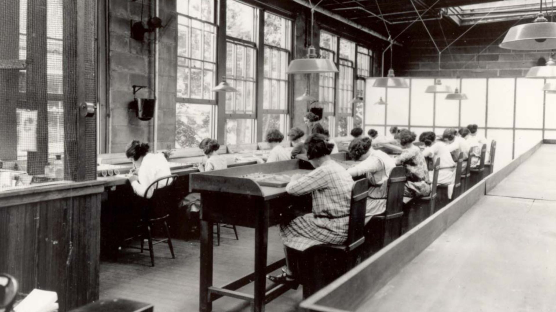 Radium Girls work in a factory of the United States Radium Corporation.
