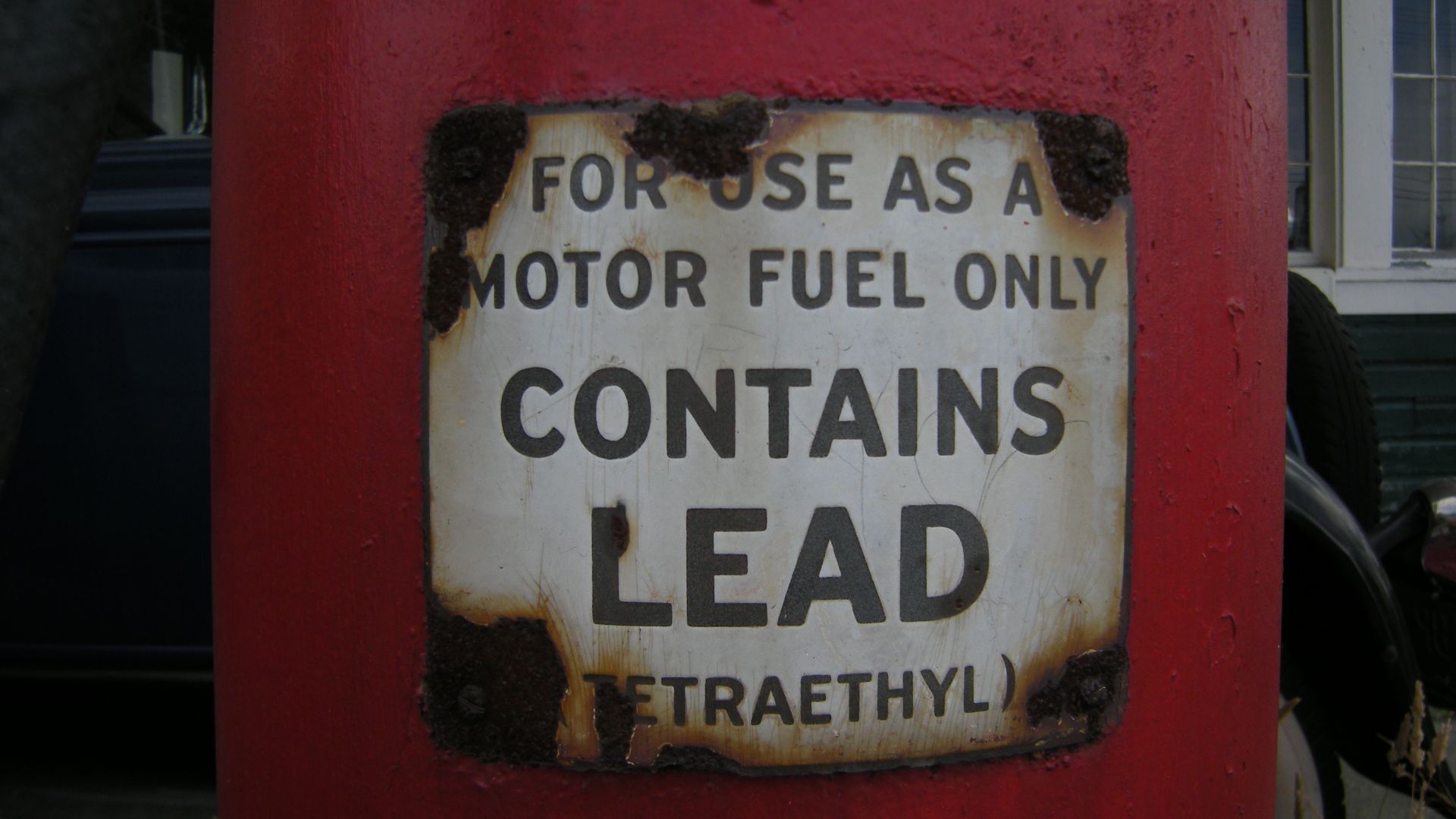 Lead warning on a gas pump at Keeler's Korner, Lynnwood, Washington. Keeler's Korner, a former grocery store and gas station (built 1927) listed on the National Register of Historic Places, listed 1982, NRHP listing #82004287.