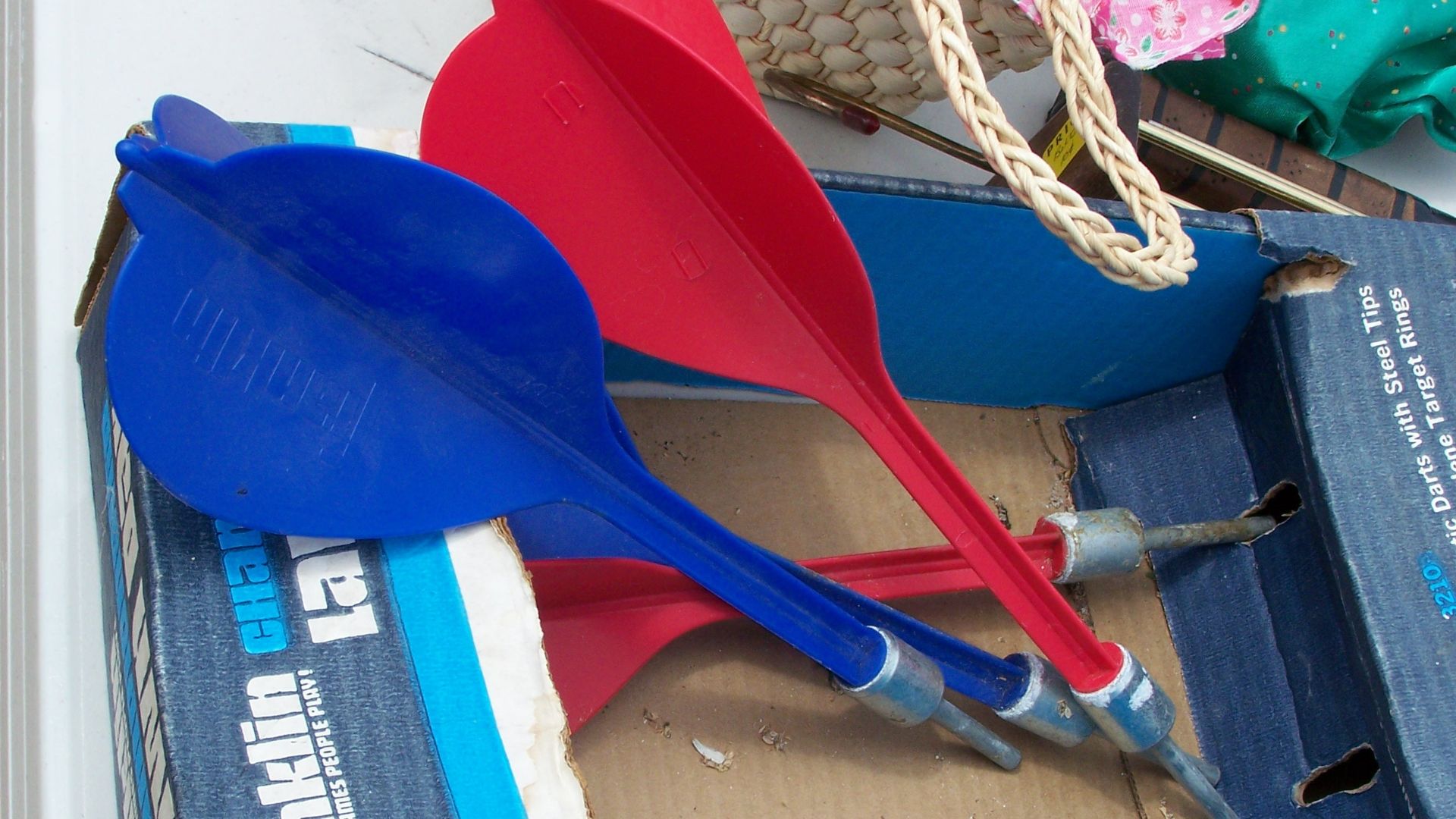 A package of Franklin brand lawn darts. Photo taken at an elementary school yard sale in Washington state, United States, with a Kodak Z650 Zoom digital camera.