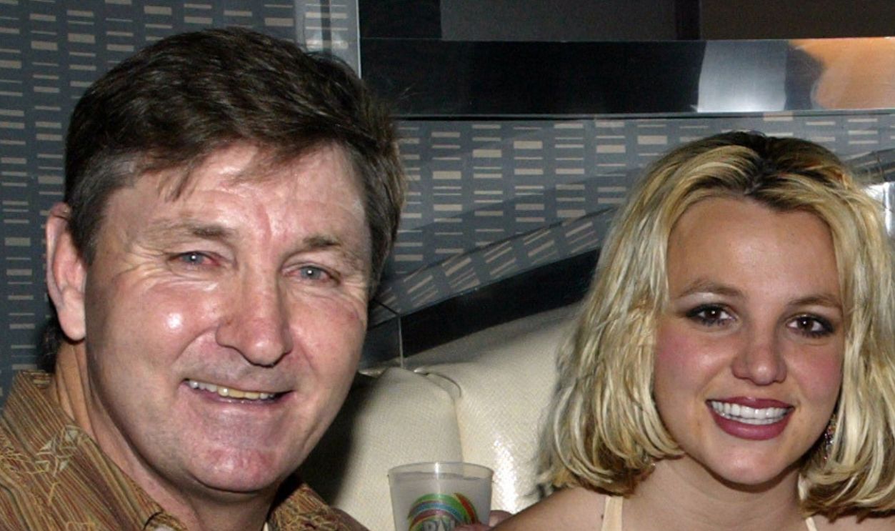 Singer Britney Spears (2nd,L) and family (L-R), father Jamie, brother Bryan and mother Lynne celebrate with Jamie Spears's partners (not shown) George and Phil Maloof and John Decastro, at the launch party for their new Palms Home Poker Host software held at the one of a kind Hardwood Suite at the Palms Casino Resort in Las Vegas.