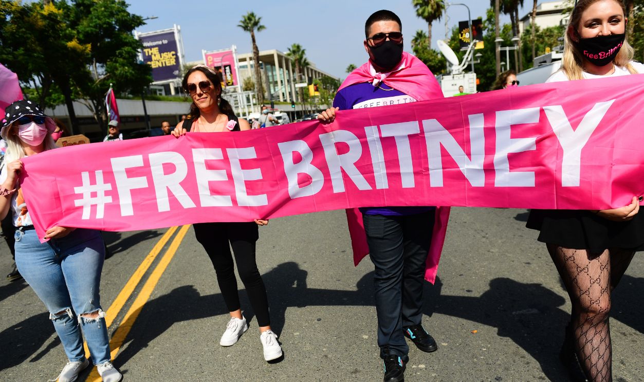 #FreeBritney activists protest during a rally held in conjunction with a hearing on the future of Britney Spears' conservatorship at the Stanley Mosk Courthouse on September 29, 2021 in Los Angeles, California. Spears was placed in a conservatorship managed by her father, Jamie Spears, and an attorney, which controls her assets and business dealings, following her involuntary hospitalization for mental care in 2008. Spears and her father have asked the court to remove him from his role in the conservatorship