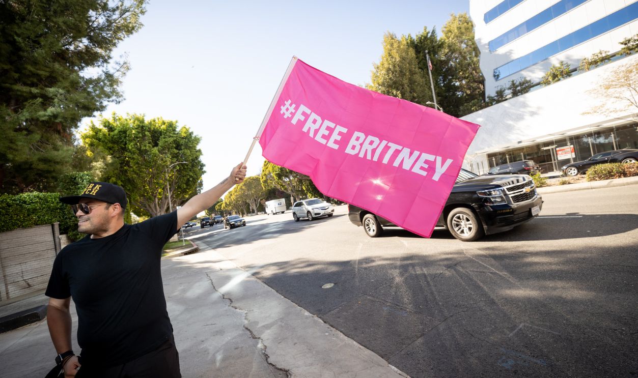  Supporters of Britney Spears hold a #FreeBritney rally outside the Tri Star Sports and Entertainment building on November 11, 2021 in West Hollywood, California