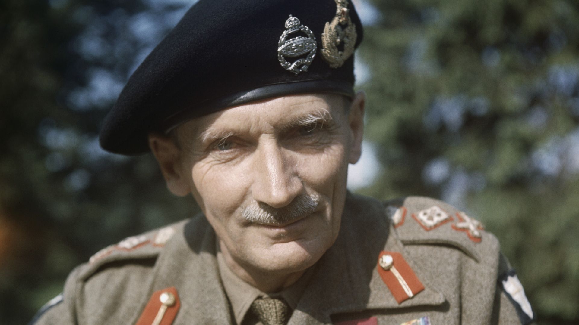 General Sir Bernard Montgomery in England, 1943
Half-length portrait of the Commander of the Eighth Army General Sir Bernard Montgomery wearing his tank beret, taken during a visit to this country.

The image is unattributed at IWM but there are other col