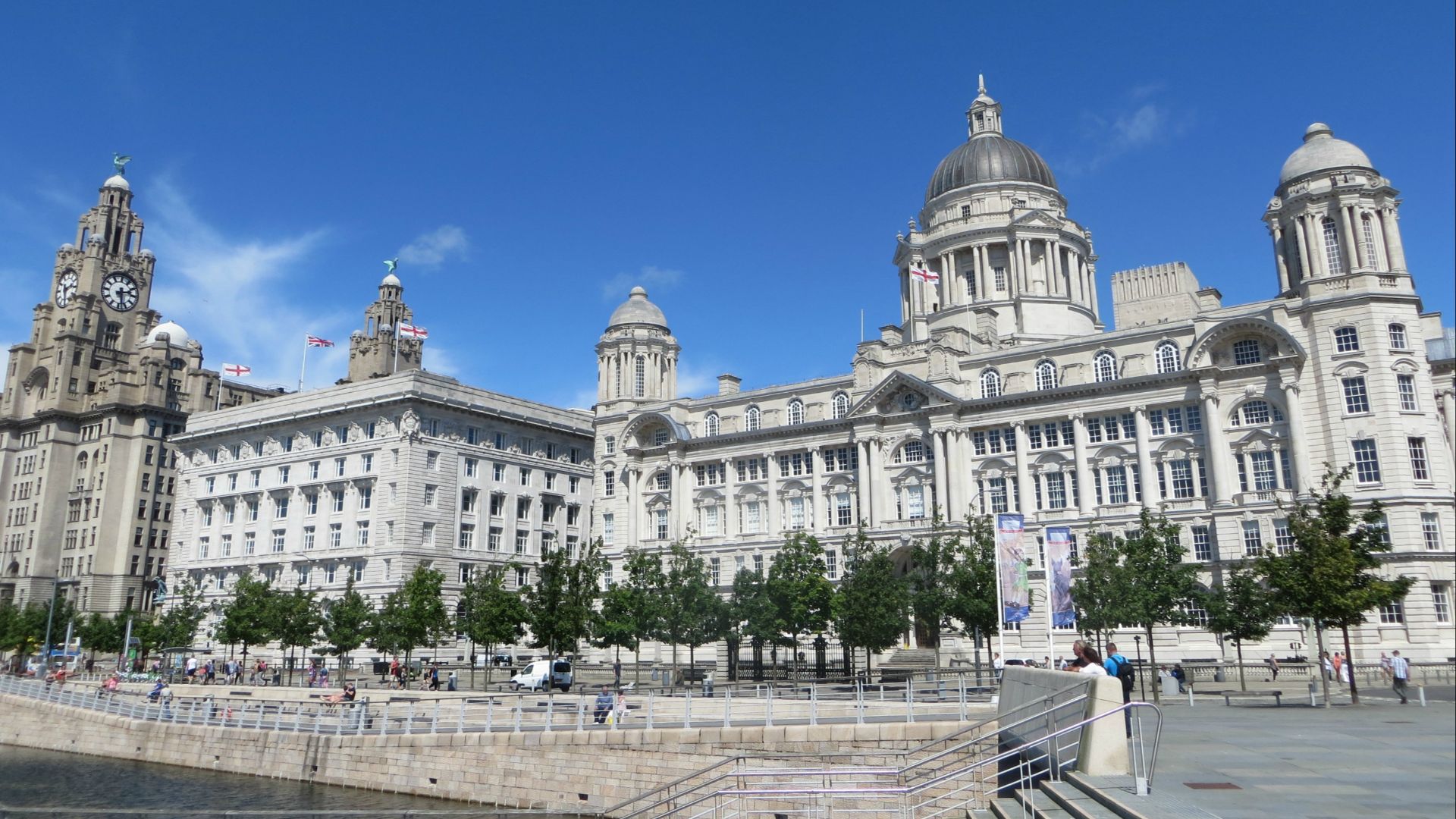 Three magnificent buildings - known as 'the Three Graces' - dominate the Liverpool waterfront at Pier Head.  On the far left is one of Liverpool's icons, the Royal Liver Building, completed in 1911.  It was built as the headquarters of the Royal Liver Ins