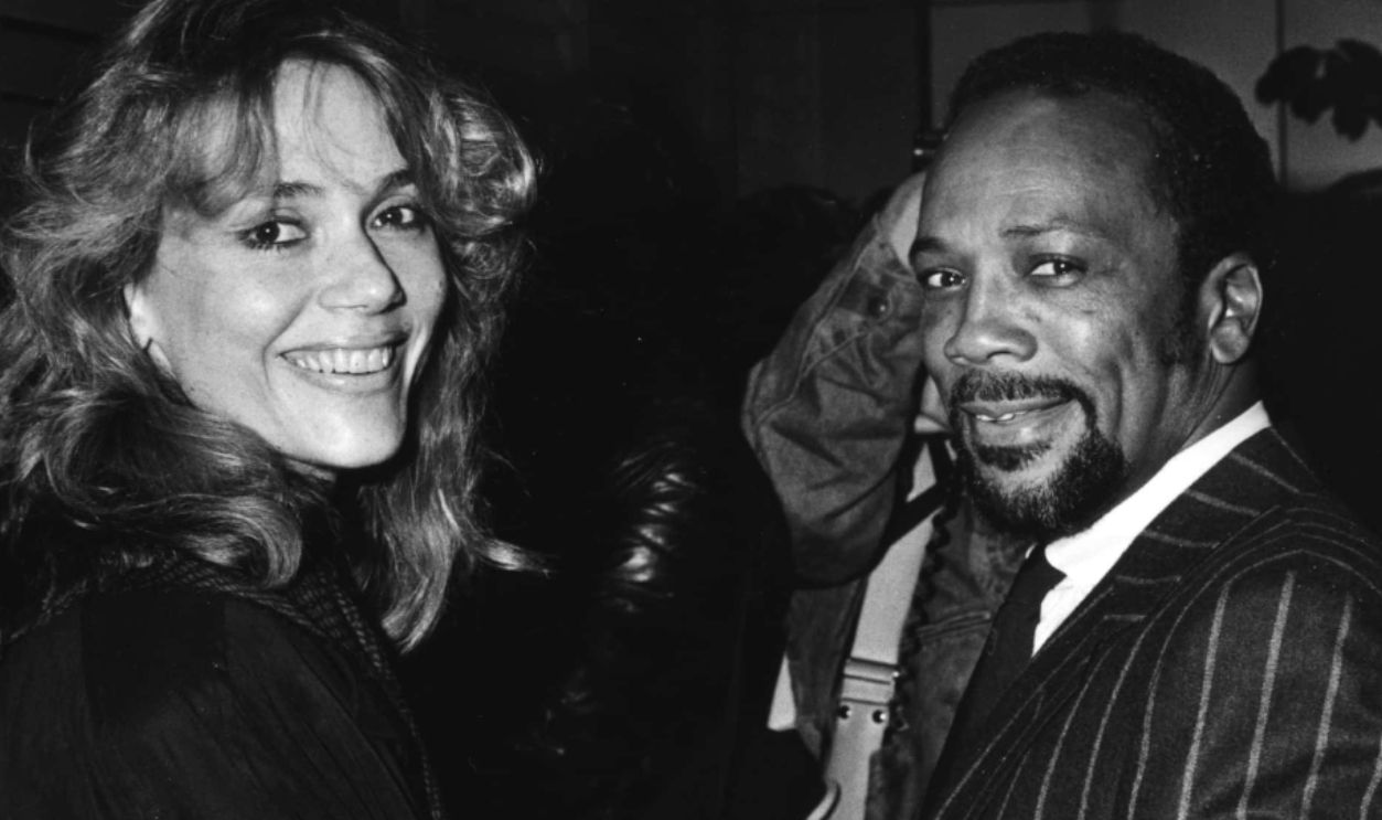 American actor Peggy Lipton and her husband American producer Quincy Jones attend an engagement party for Maria Shriver and Arnold Schwarzenegger, held at Nicky Blair's on the Sunset Strip, Los Angeles, California, February, 1986.