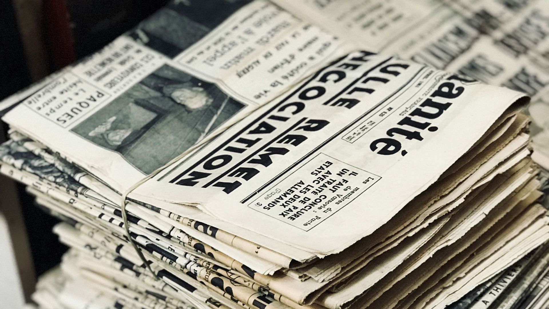 bundle of newspaper on table