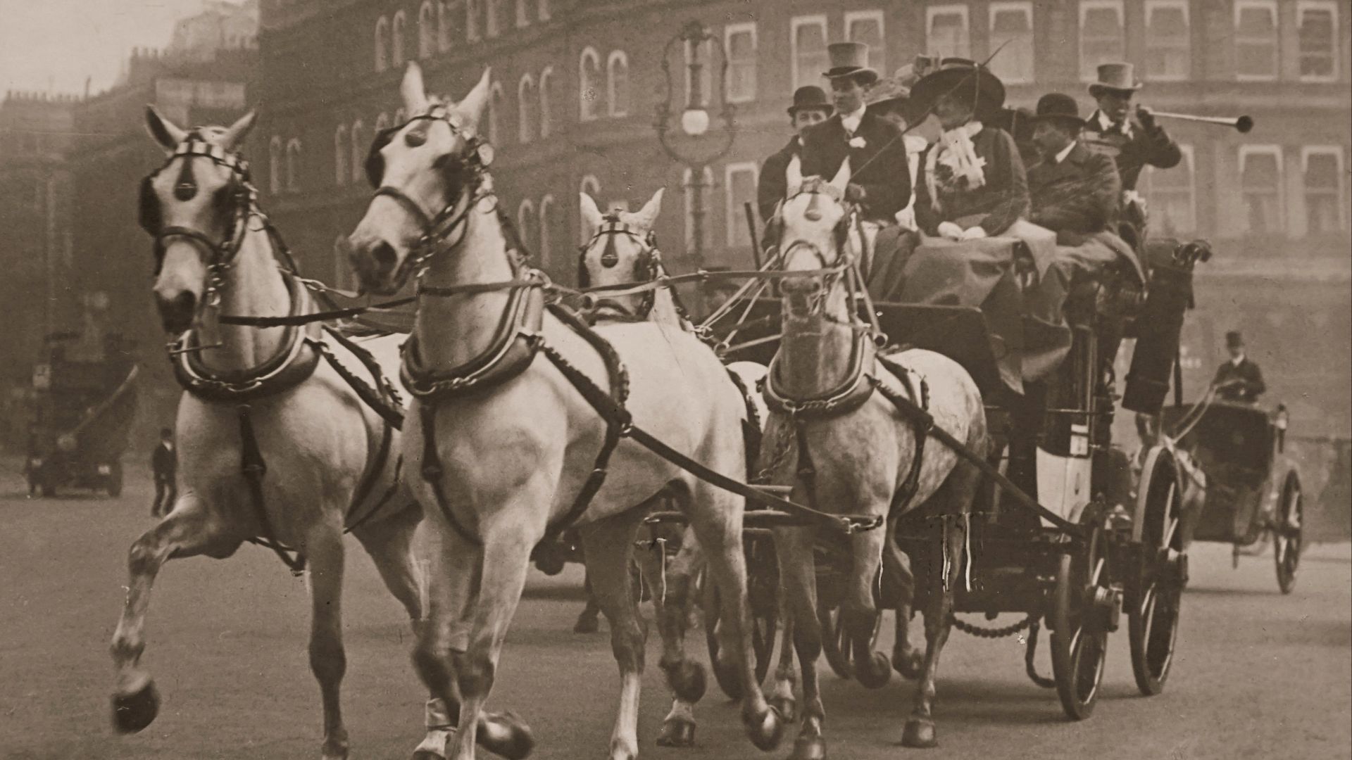 Elegant vintage photo of a horse-drawn carriage with passengers in a historical city scene.