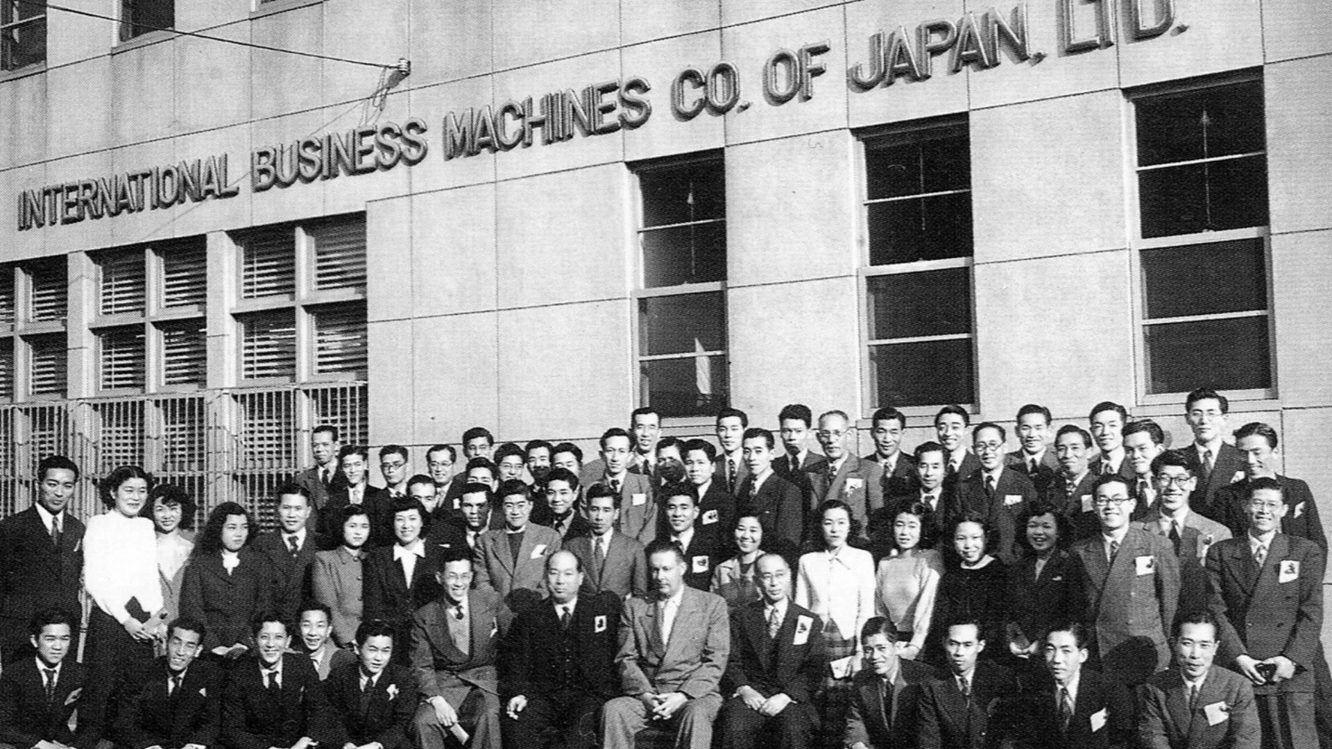 IBM Japan employees at Kanda-Tsukasamachi office in 1950.From the left of the center, Kaoru Andō (Education Manager), Otohisa Yakō (Executive Sales Manager), Charles M. Decker (CEO), Kō Mizushina (Executive).