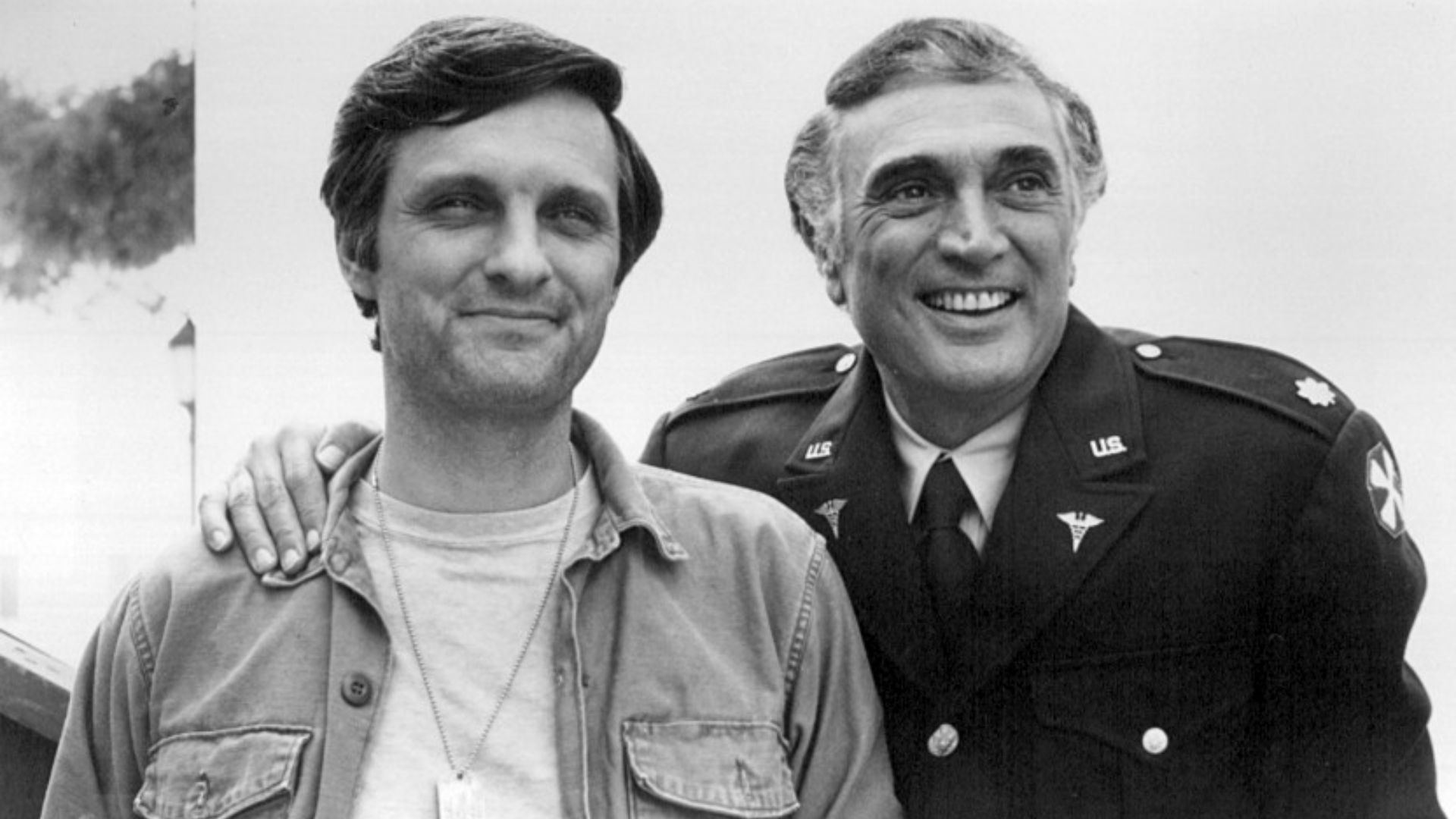 Photo of Alan Alda with his father, Robert Alda, from the television program M*A*S*H.  The senior Alda had a guest-starring role as a noted surgeon visiting the 4077th.  This was the first time the two Aldas worked together on film.