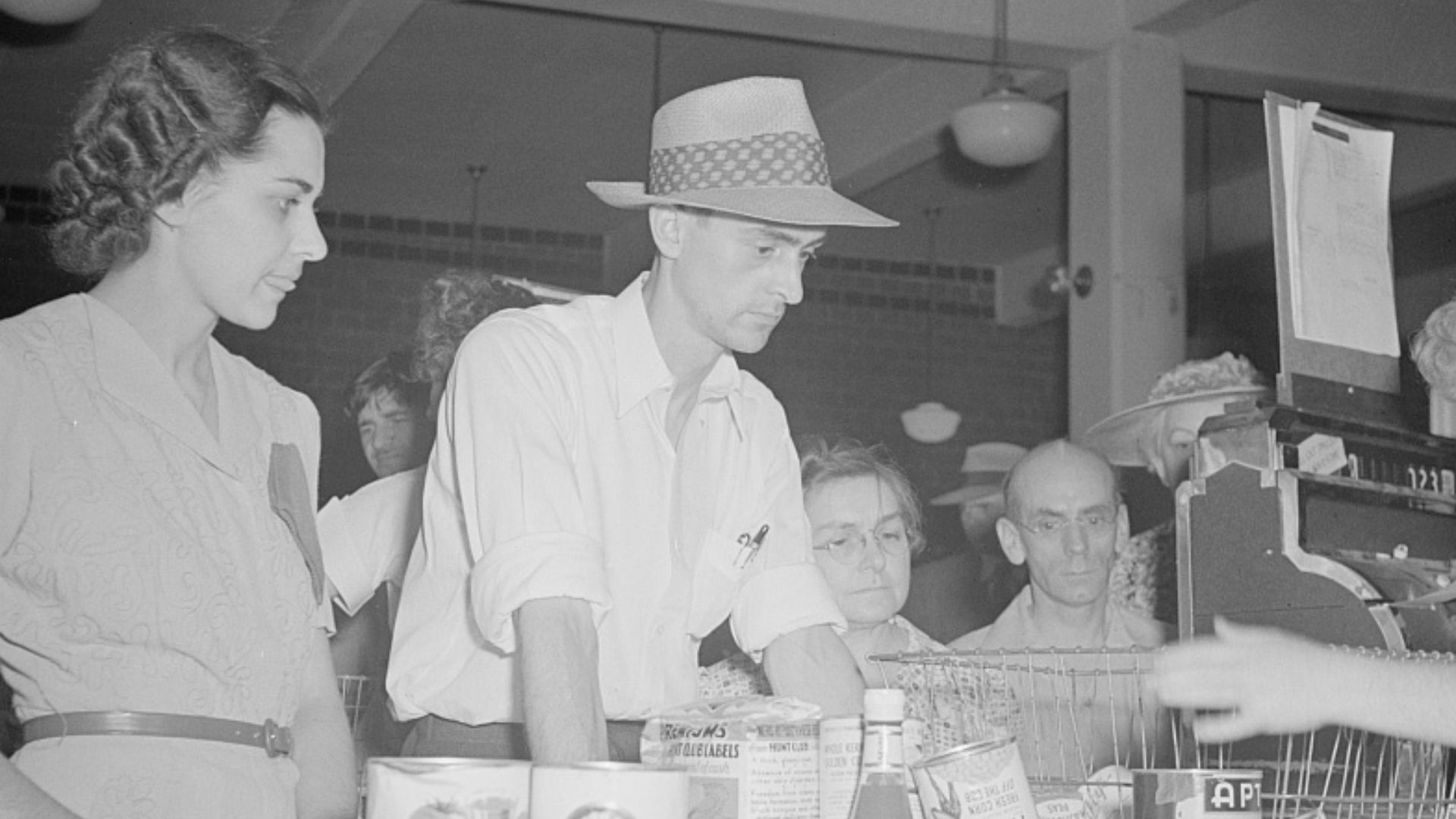 Washington, D.C. Cashier checking out a customer's purchases at the Giant Food shopping center