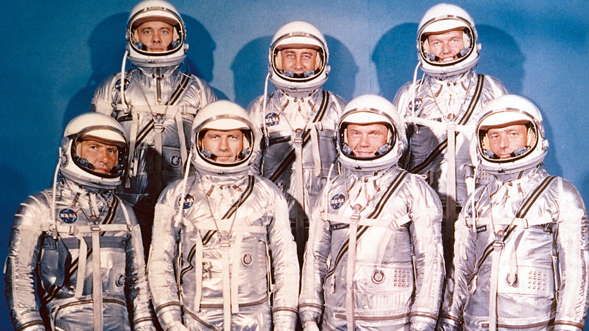 Project Mercury Astronauts, whose selection was announced on April 9, 1959, only six months after the National Aeronautics and Space Administration was formally established on October 1, 1958. They are: front row, left to right, Walter H. Schirra, Jr., Do