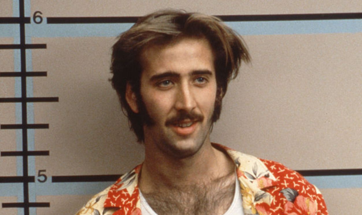 American actor Nicolas Cage on the set of Raising Arizona, written, directed, and produced by Ethan and Joel Coen. 