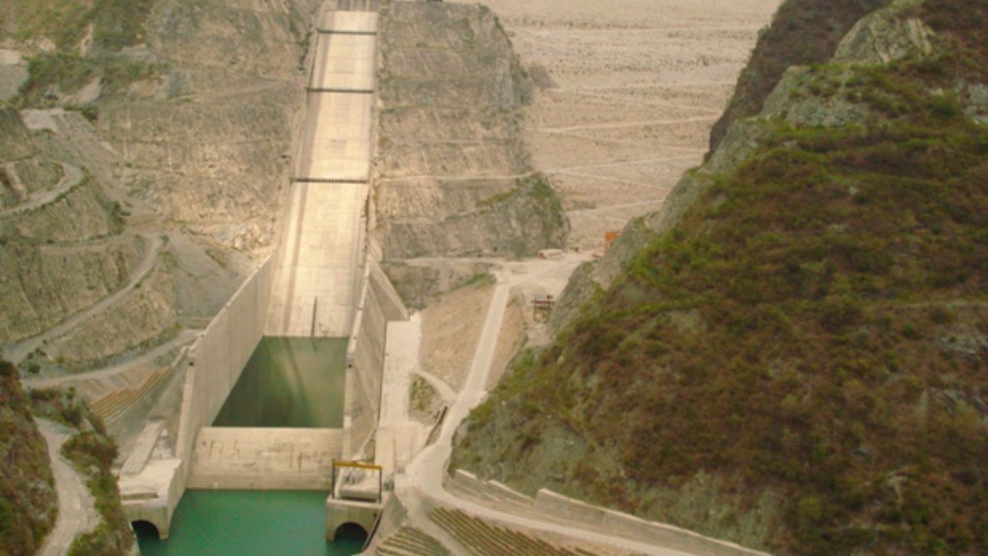 A pic of the Tehri dam taken from a moving bus... the Tehri dam on the Bhagirathi river is a man made wonder, and is the largest rock and earth fill dam in Asia. The reservoir of the dam drowned the District headquarters of Tehri, which have now been shif