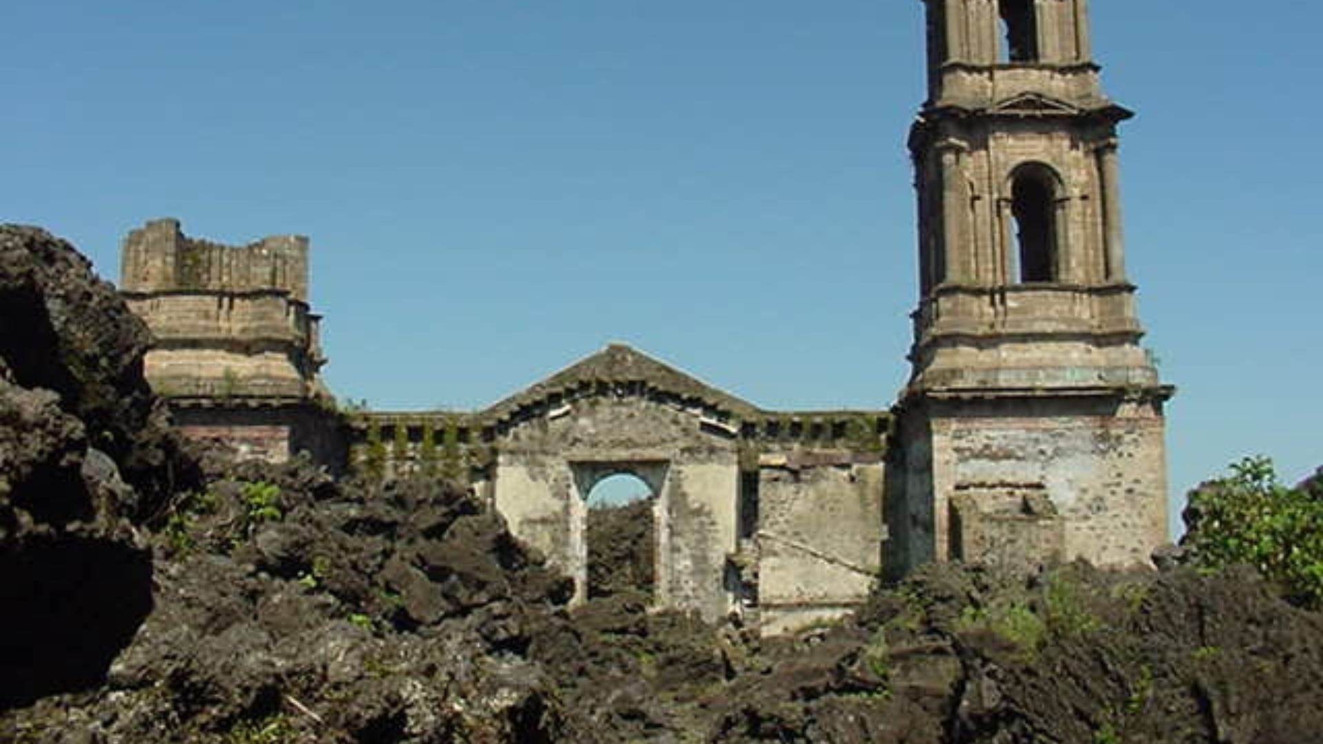 Remnants of the main church of San Juan Parangaricutiro, Mexico. The village was covered in lava and destroyed by the volcano Parícutin eruption in 1943–1952.