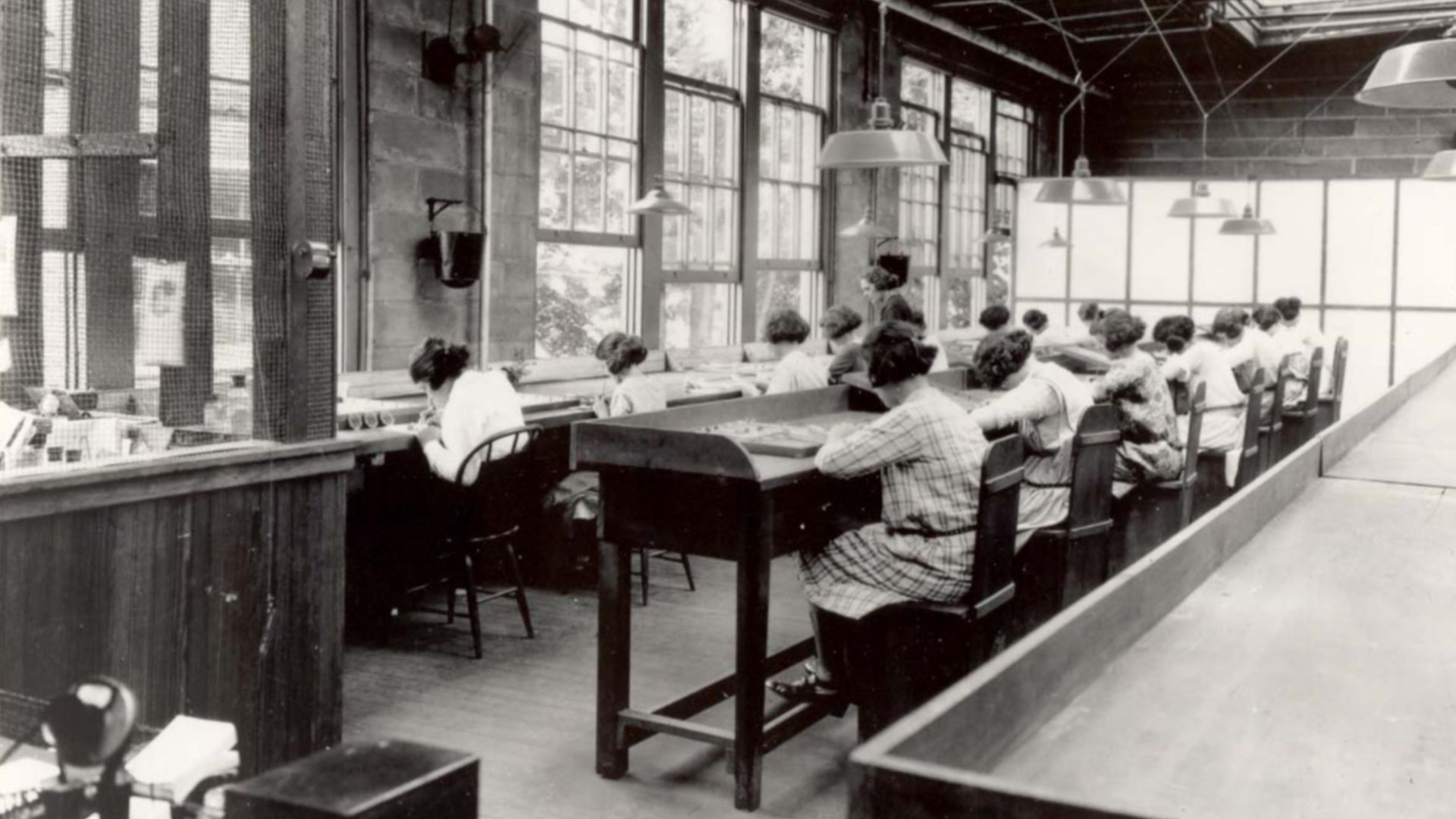 Radium Girls work in a factory of the United States Radium Corporation.