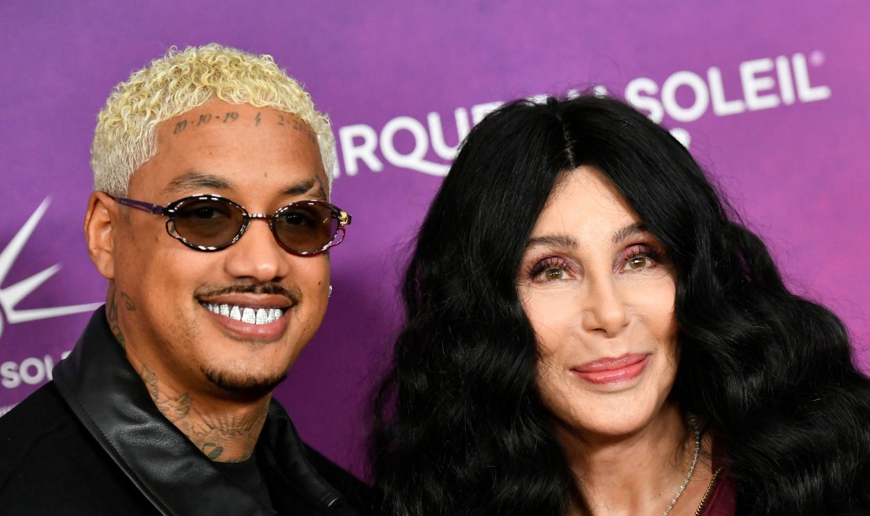 SANTA MONICA, CALIFORNIA - OCTOBER 24: Alexander Edwards and Cher attend Cirque du Soleil's "KOOZA" Red Carpet Premiere at Santa Monica Pier on October 24, 2024 in Santa Monica, California. 