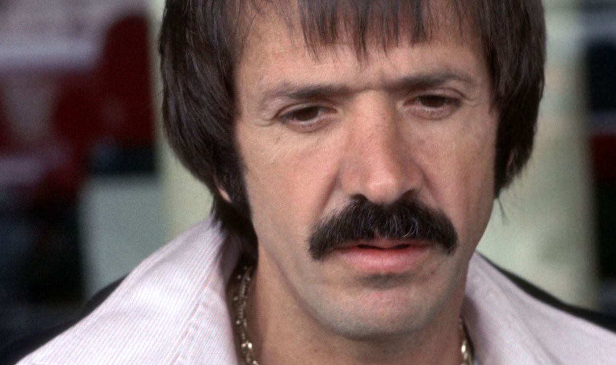 LOS ANGELES - JUNE 12 Singer Sonny Bono on June 12, 1977 arrives at the Los Angeles International Airport in Los Angeles, California. 