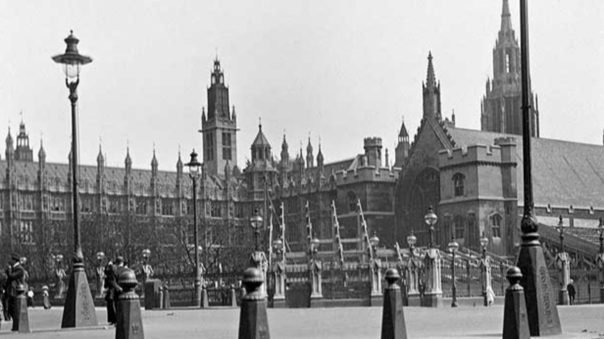 Palace Of Westminster, Parliament Square. A view showing the Palace of Westminster behind a grandstand being erected for the coronation of King George V.
