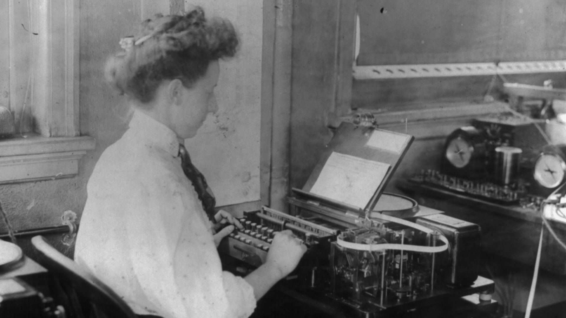 Title: Barclay telegraph instrument. Stamping machine with woman operator
Abstract/medium: 1 photographic print.