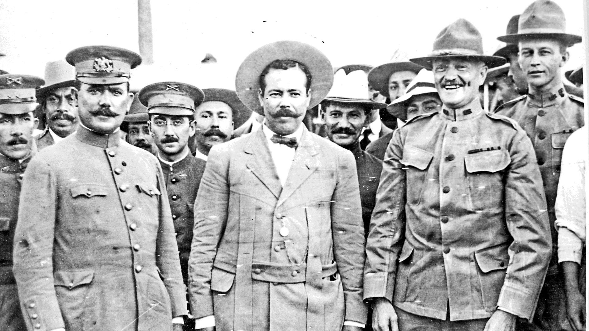 Generals Obregon, Villa and Pershing meet in El Paso, Texas. Immediately behind Pershing on his left is his aide Lt. George S. Patton.