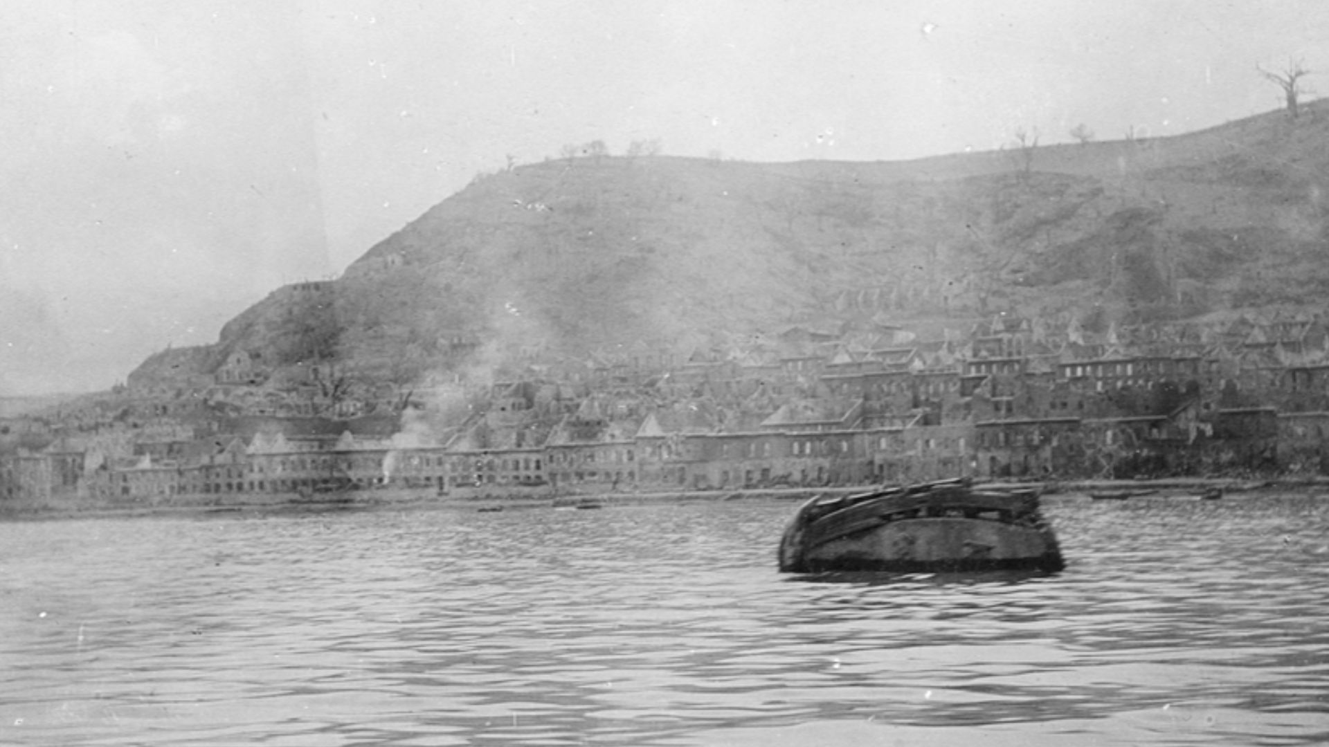 Title: [View of St. Pierre, Martinique, from harbor after eruption of Mt. Pelee]
Creator: Cooper, W.G.
Date: 1902
Part Of: Mt. Pelee volcano, St. Pierre, Martinique
Description: Photograph from album that includes views of Martinique and destruction, dead