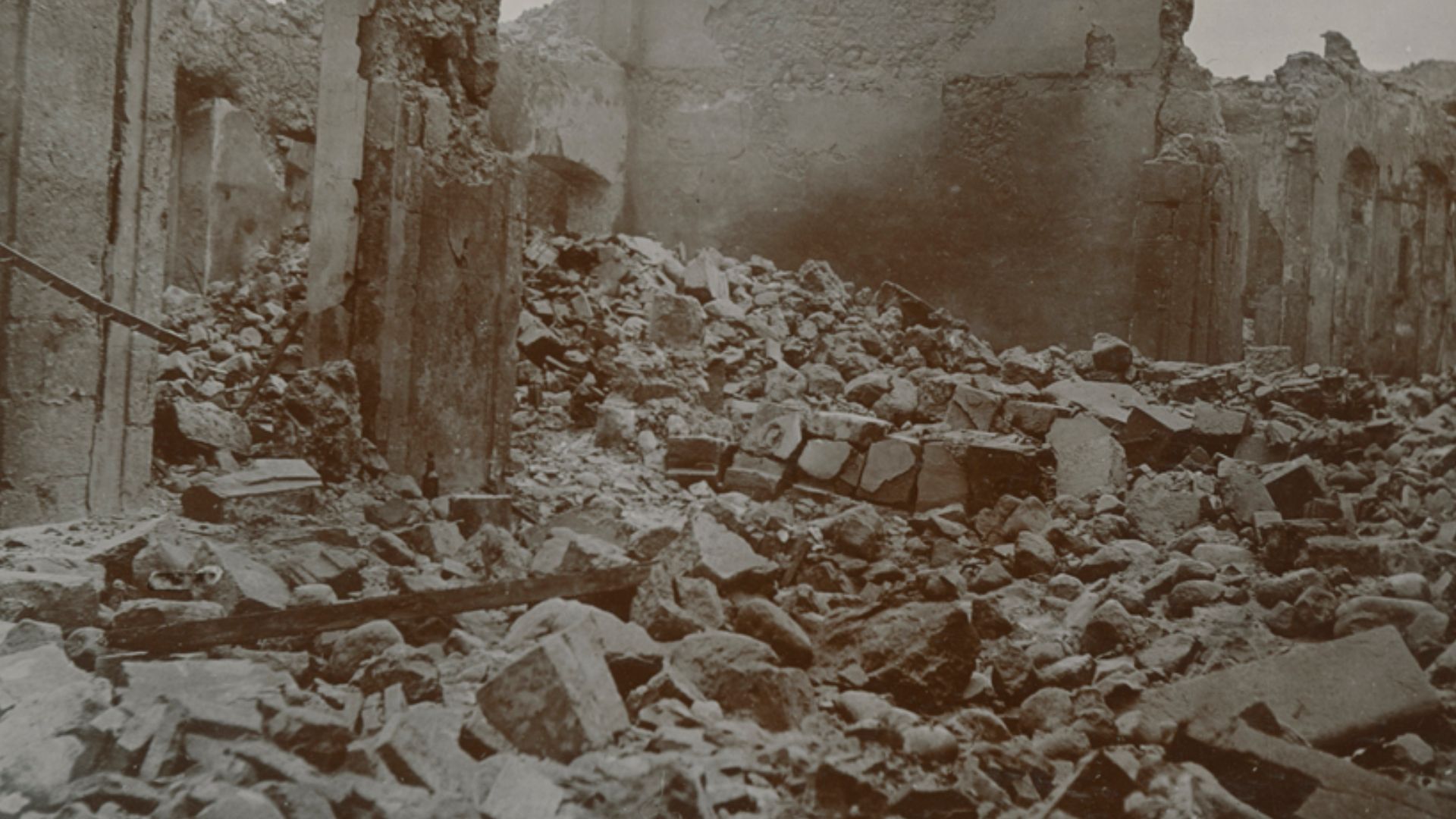 Title: [View of St. Pierre, Martinique, after eruption of Mt. Pelee]
Creator: Cooper, W.G.
Date: 1902
Part Of: Mt. Pelee volcano, St. Pierre, Martinique
Description: Photograph from album that includes views of Martinique and destruction, dead, and rubble
