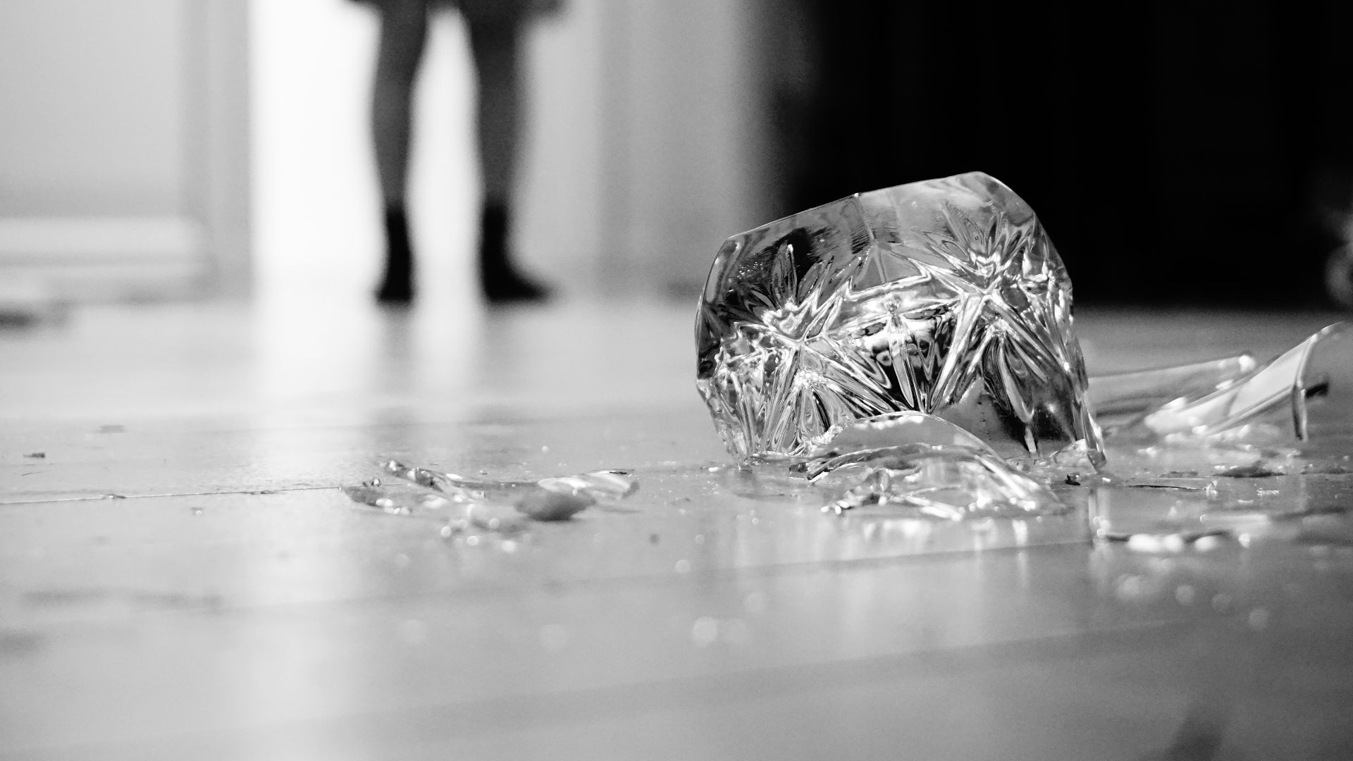 a broken glass on the floor