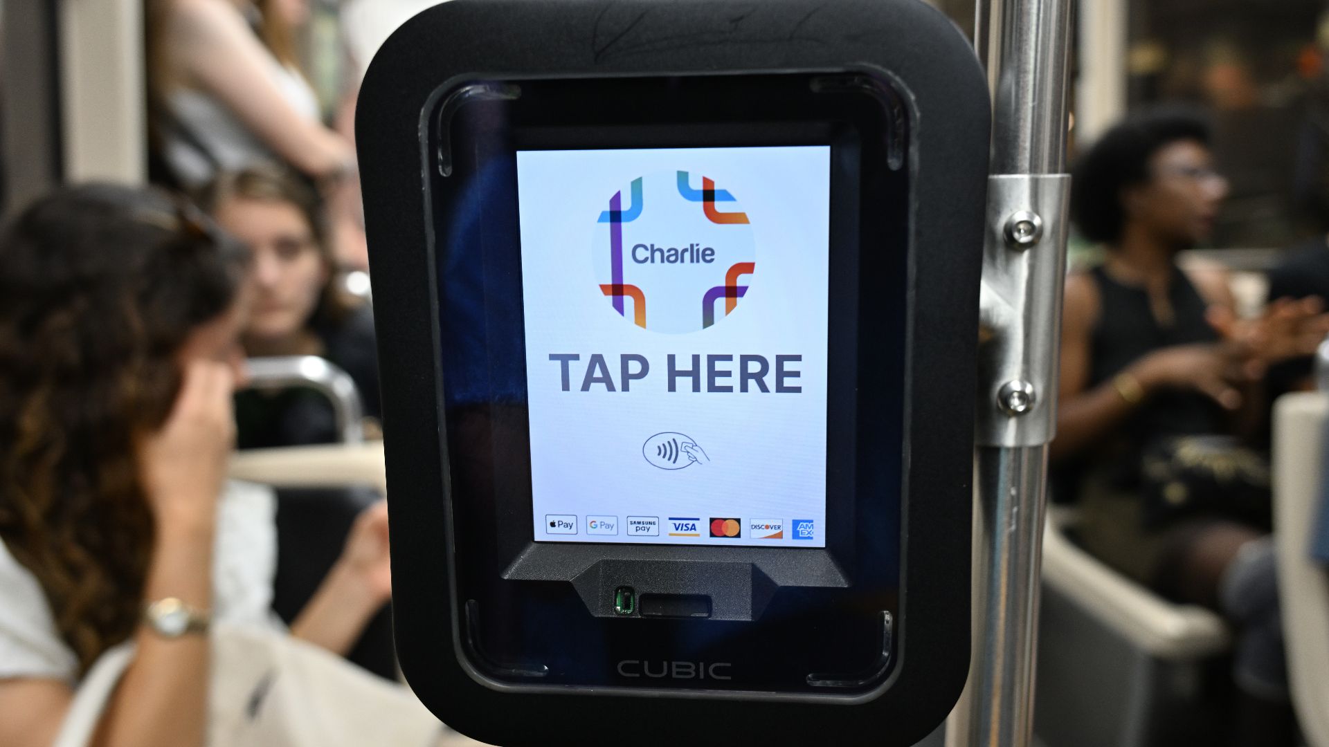 A Cubic contactless payment fare reader on the rear door of a Green Line Train.