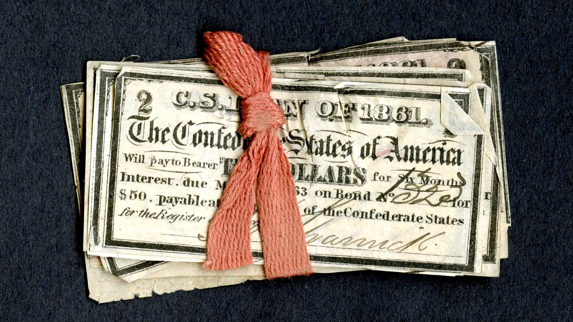 “Red tape” used to bind bundles of redeemed Civil War-era Confederacy bond coupons.