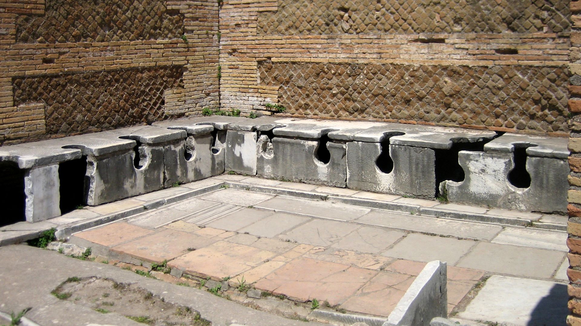 Latrine, opposite of the entrance to the forum baths.