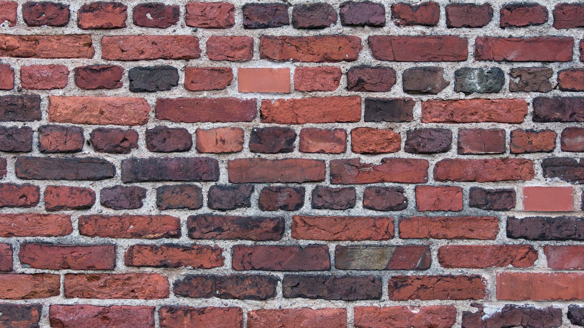 brown and black concrete brick wall