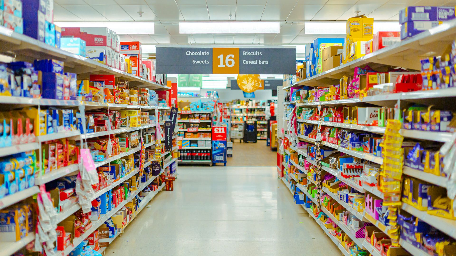 a grocery store aisle filled with lots of food