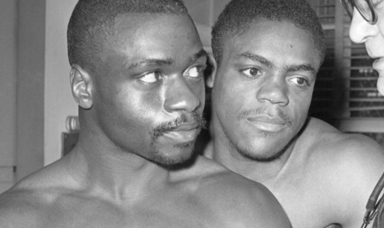 Pre-fite physical at 224 W. 47th St Rubin (Hurricane) Carter (left) and Walter Daniels (center get the weigh-in and okay from Dr. Samuel Swetnick in pre-fite physical for Next week's 10 rounder at St. Nicks.