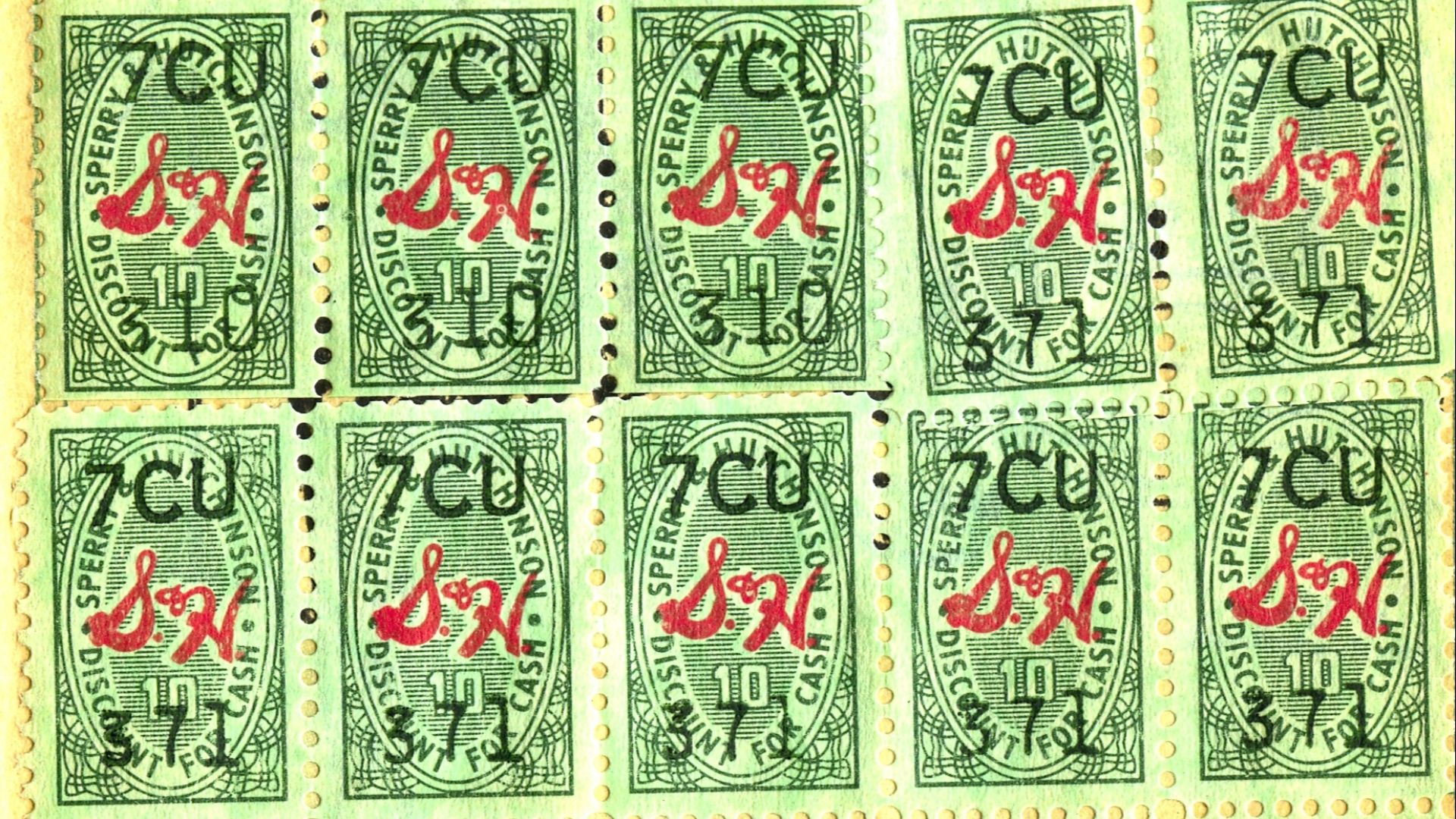 Thirty S & H Green Stamps pasted onto a collection page (including two intact 10-stamp sheets, rows 1-2 and 4-5).