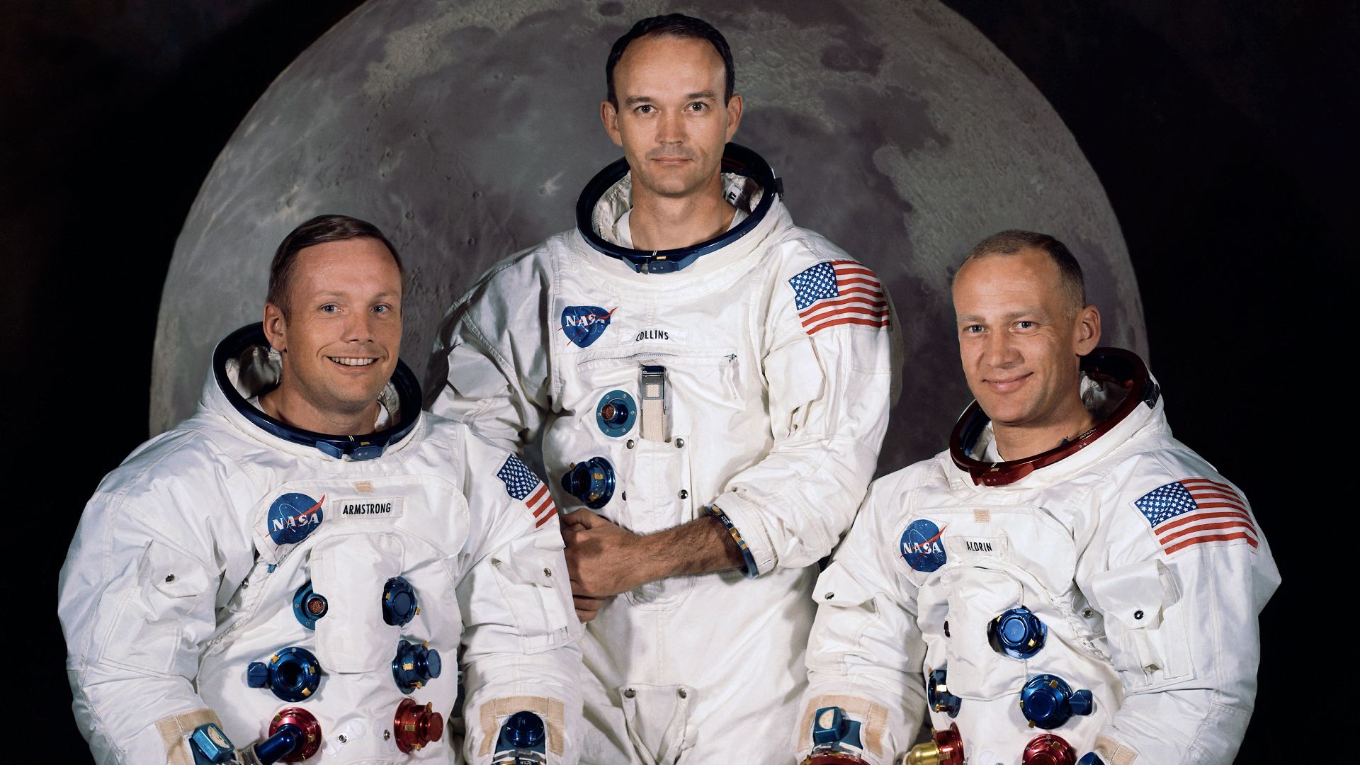 The Apollo 11 lunar landing mission crew, pictured from left to right, Neil A. Armstrong, commander; Michael Collins, command module pilot; and Edwin E. Aldrin Jr., lunar module pilot.