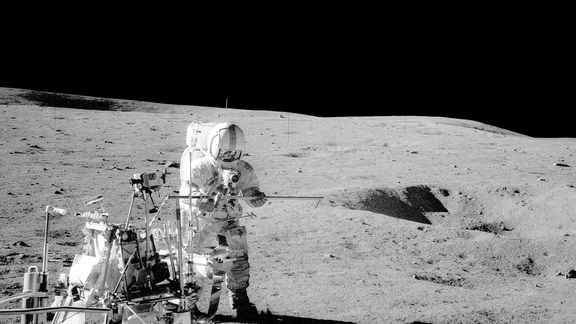 Apollo 14 Commander Alan Shepard stands by the Modular Equipment Transporter (MET).  The MET, which the astronauts nicknamed the
