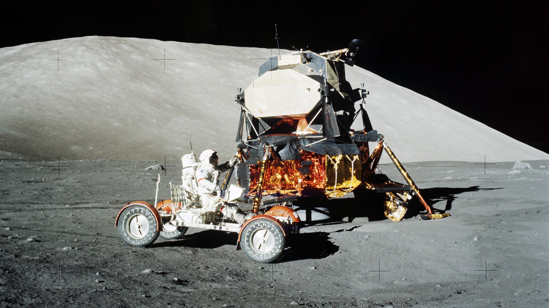Apollo 17 mission, 12 December 1972. Astronaut Eugene A. Cernan, commander, makes a short checkout of the Lunar Roving Vehicle (LRV) during the early part of the first Apollo 17 Extravehicular Activity (EVA-1) at the Taurus-Littrow landing site.