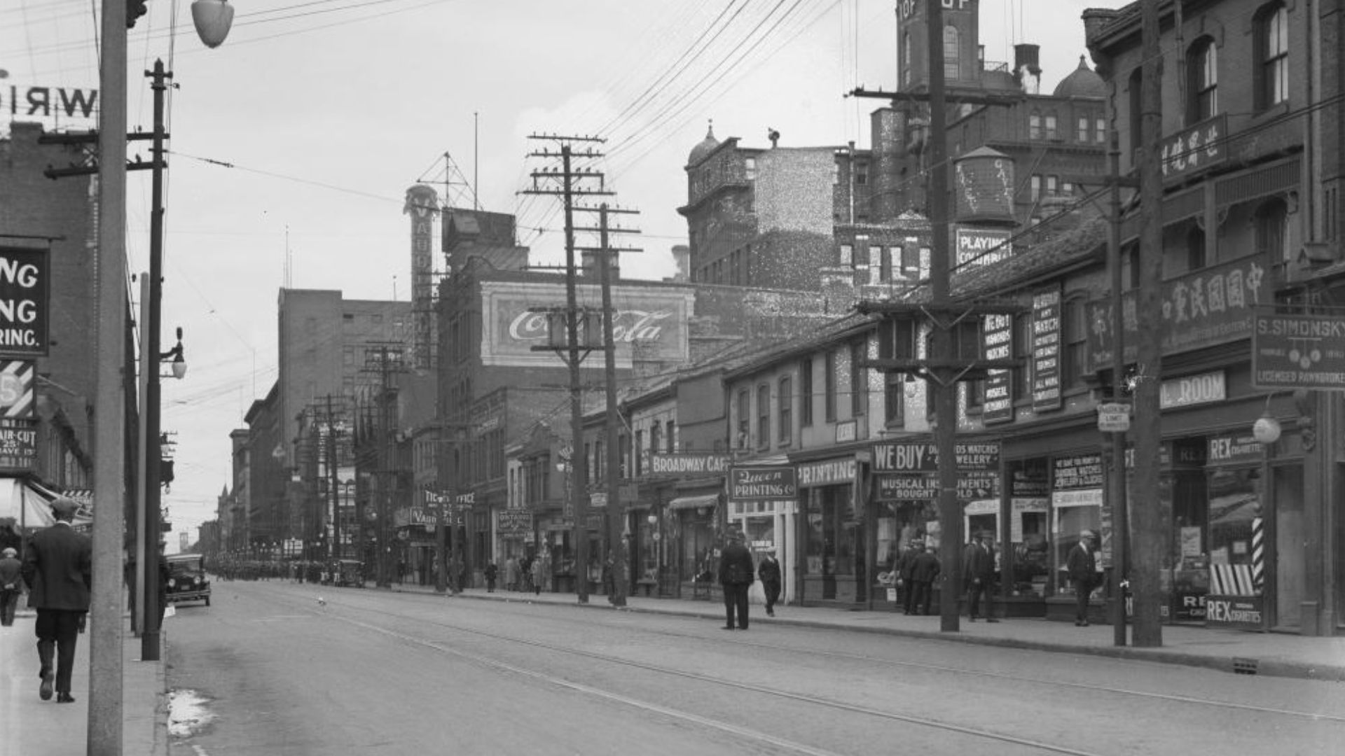 Queen Street West, south side, looking east from York Street.  Toronto, Ontario, Canada.