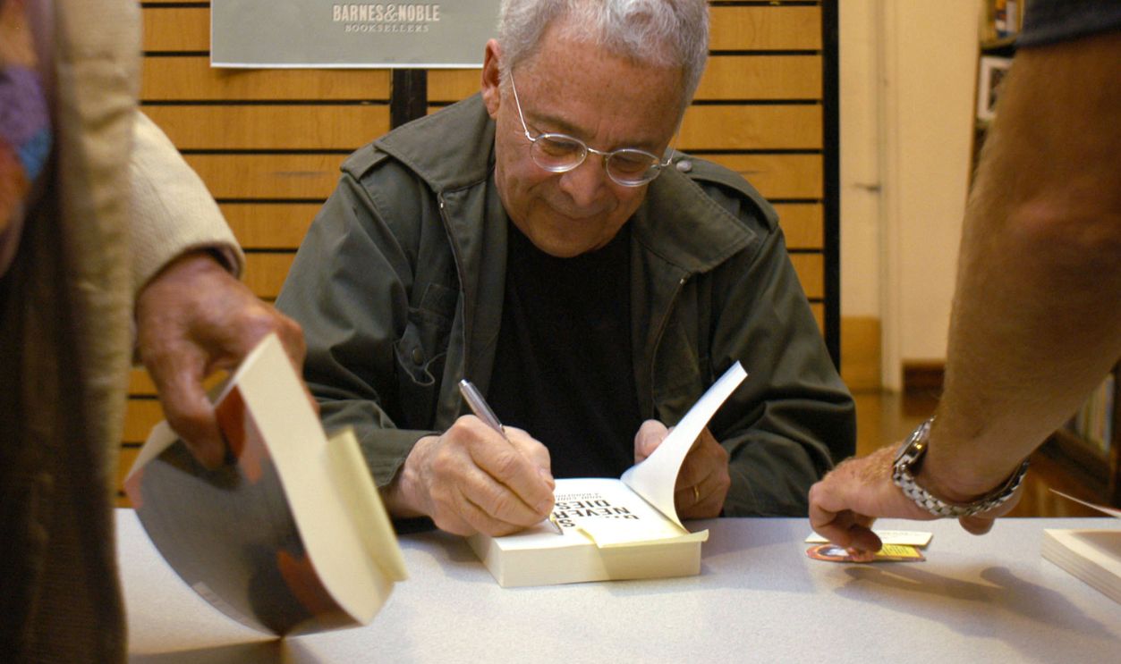 NEW YORK - JUNE 30: Writer Chuck Barris signs copies of his new book, "Bad Grass Never Dies," during a book signing June 30, 2004 in New York City. 