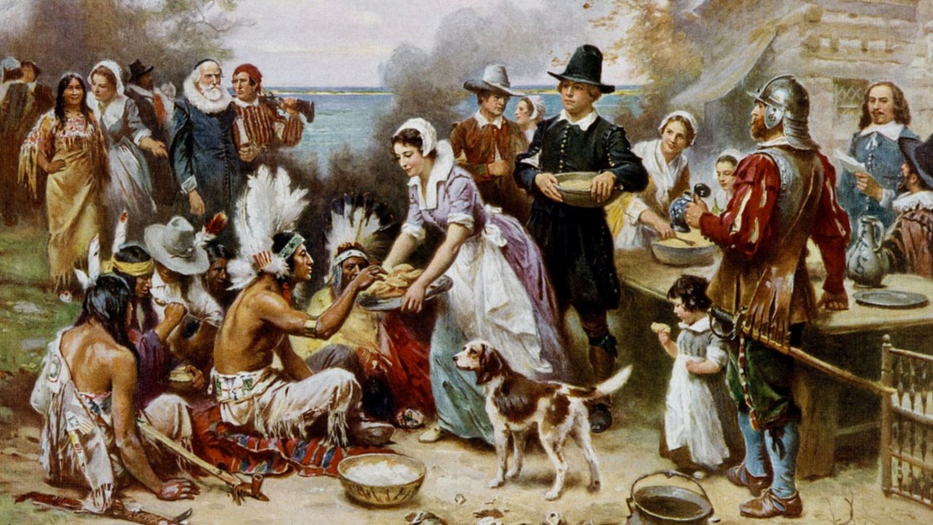 A romanticised portrayal of pilgrims and natives who appear to assemble to share a Thanksgiving meal, apparently their first.