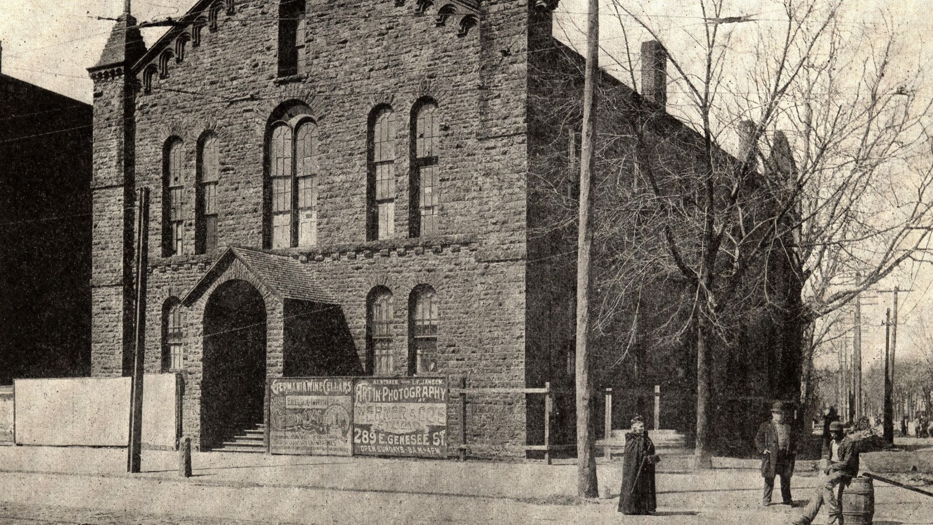 The Buffalo Medical College building, located from 1850 through 1893 at the southwest corner of Main and Virginia Streets in the Allentown section of Buffalo, New York. The advertisement for Albert Werner's photography studio indicates that this picture w