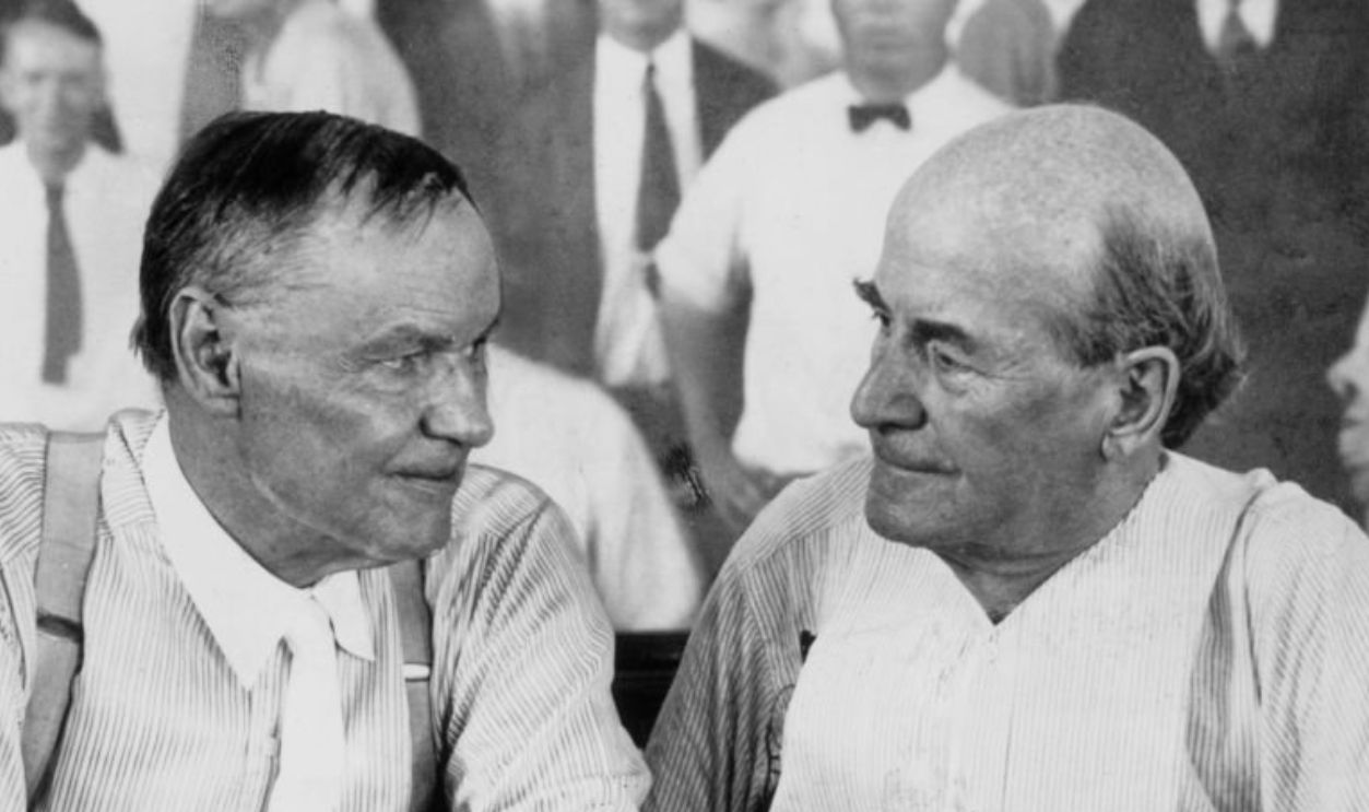 July 1925: Attorney Clarence Darrow (1857 - 1938) (L) defence lawyer, with politician William Jennings Bryan (1860 - 1925), director of the prosecution, in the courtroom during the Scopes 'monkey trial', South Dayton, Tennessee. Bryan died of a cerebral haemorrhage a few days after the trial. 