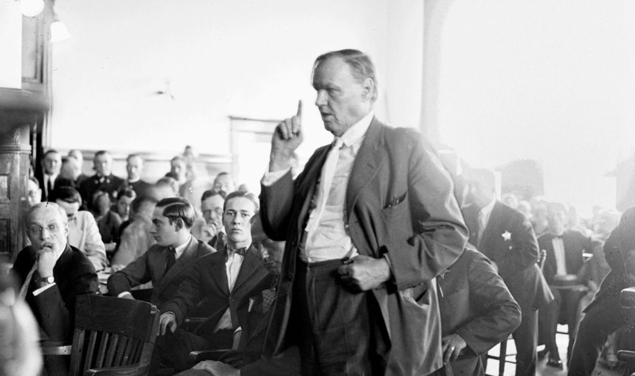 UNITED STATES - JULY 23: During the 'Trial of the Century', defense attorney Clarence Darrow, points a finger up while arguing for the defense in the center of a crowded courtroom in Chicago, July 1924. The young defendants Nathan Leopold and Richard Loeb can be seen seated to Darrow's right.