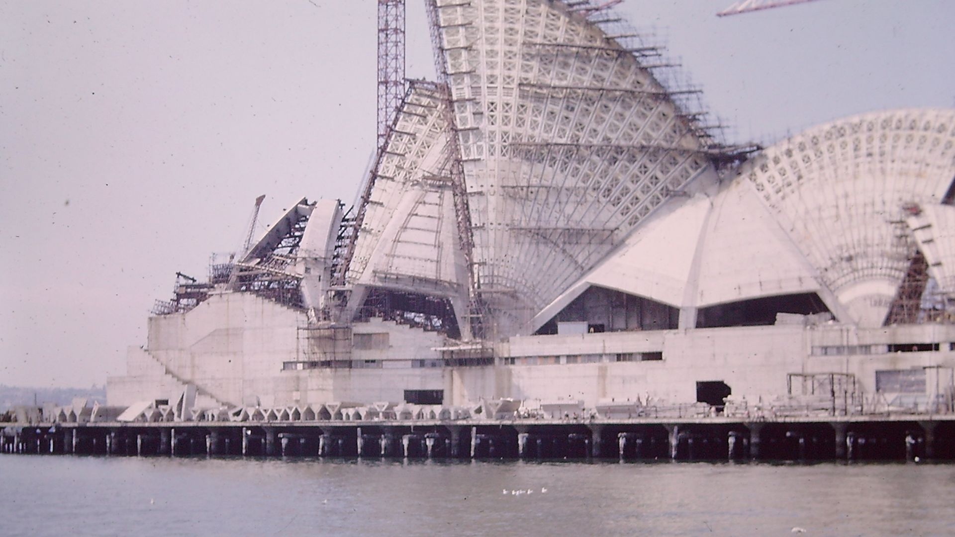A photograph of the Sydney Opera House being built around 1964